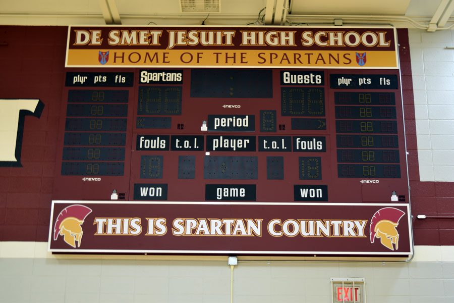 Two new scoreboards were put up in the gym.  The board on the far side of the gym is larger and goes more in-depth with game details.