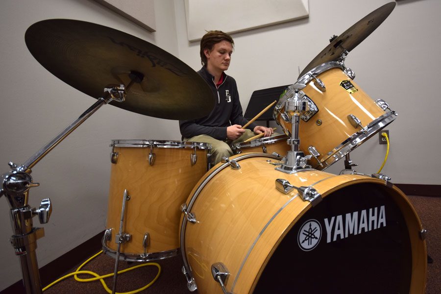 Sophomore Jack Windler practices jaming out on his drum set