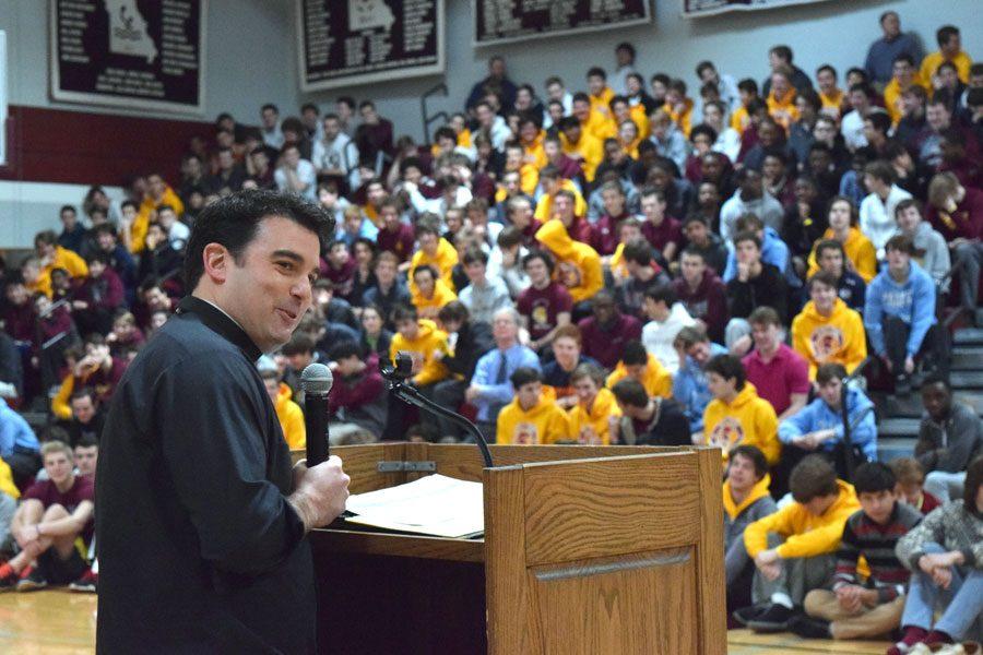 Fr. Ronny O’Dwyer, S.J., the director of the Billiken Teacher Corp at St. Louis University, addresses the student body during an all-school prayer service on Feb. 13.