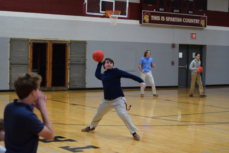 Senior Matt Linomaz launches a dodge ball toward the opposing team to win the competition for his house.