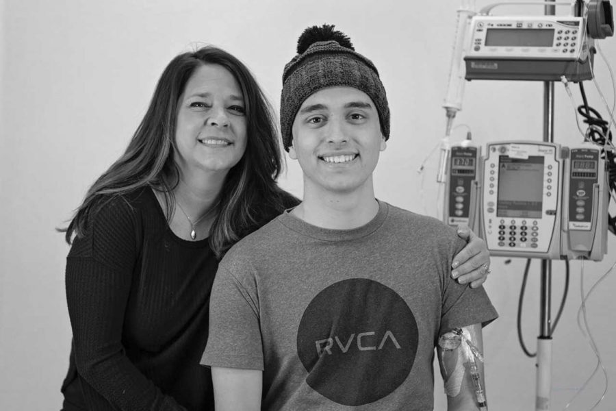Jack and his mom pose for a professional picture while he receives treatment in the hospital.