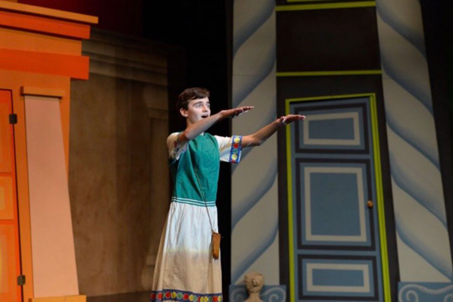 Sophomore Ryan Hughes performs during the musical, "A funny thing happened on the way to the forum."