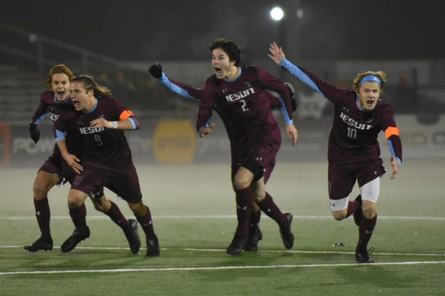 Carson+Wilhelm%2C+Nick+Grewe%2C+Thomas+Redmond%2C+and+Henry+Lawlor+celebrate+moments+after+winning+the+MSHSAA+Class+4+State+Soccer+championship+at+Soccer+Park.