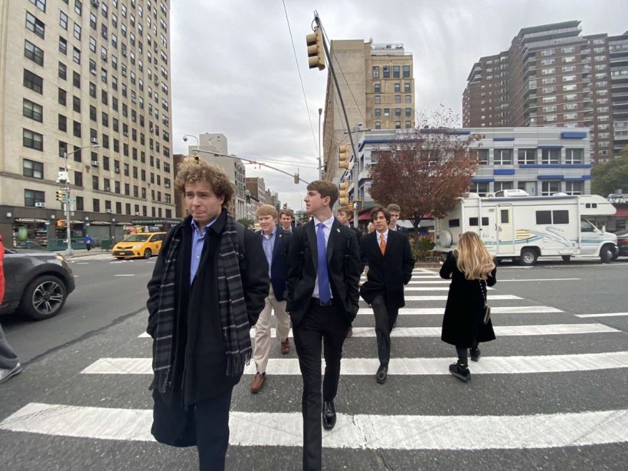 Seniors Seth Roggenkamp and Nick Quarnstrom cross the street before a meeting with ABInbev