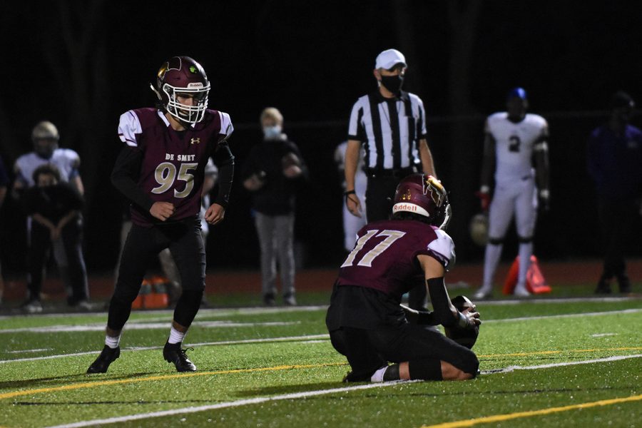 Junior kicker Luke Rothermich kicks an extra-point against CBC in the district semifinal football game Nov. 6.