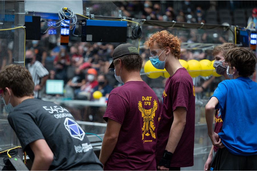 Austin York 22 and Thomas Schuster 21 look into the arena during the GRC Robotics. Competition