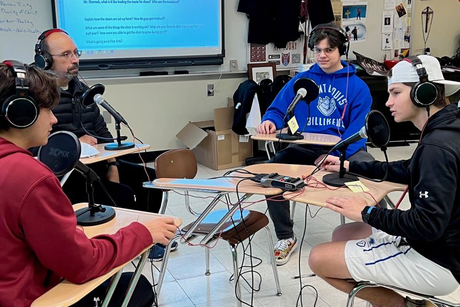 Kyle Granquist 22 discusses the spring musical Be More Chill with Nick Abel 22, music director Ray Sharrock and Beau Reichert 22. The group is using the new podcast club to discuss school issues.