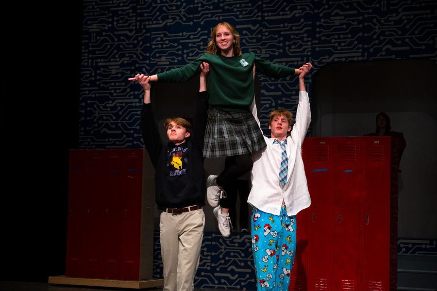 Matthew Hodge 24, Lily Pingleton (St. Joseph 23), and Alex Rodriguez 22 rehearse a dance scene in the Musical Be More Chill.