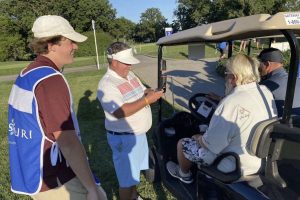Senior golfer meets his hero