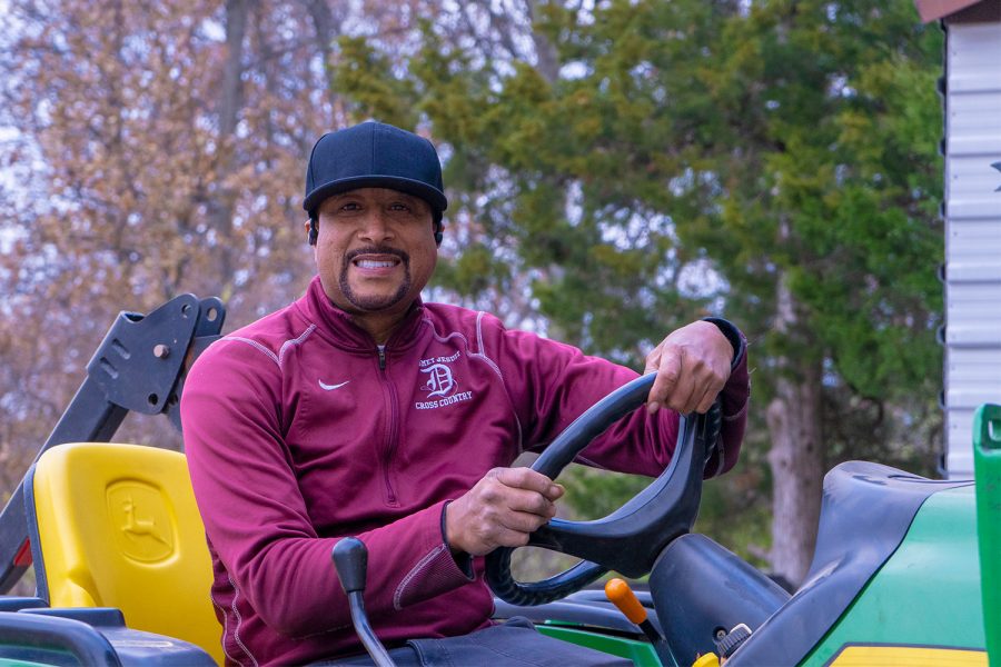 Mr. Paul Harris works hard on the grounds keeping around De Smet