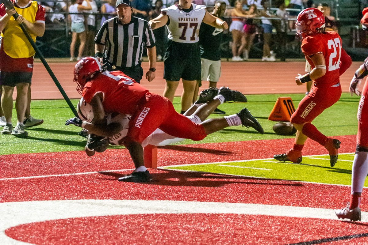 Jayden McCaster '26 dives into the corner of the endzone for a 2 yard TD run to give the Spartans a 24-7 lead over Kirkwood in the 3rd quarter.