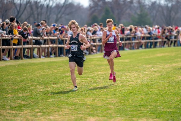 Will Poelker battles for position towards the finish line at the Missouri Class 4 State Championship Nov. 4, 2022. Poelker, who finished 24th, returns for his junior year.