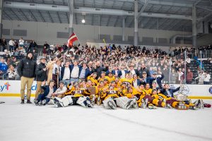 The team poses with the fans to celebrate their second-straight Challenge Cup Championship. It was the Spartans 16th title.
