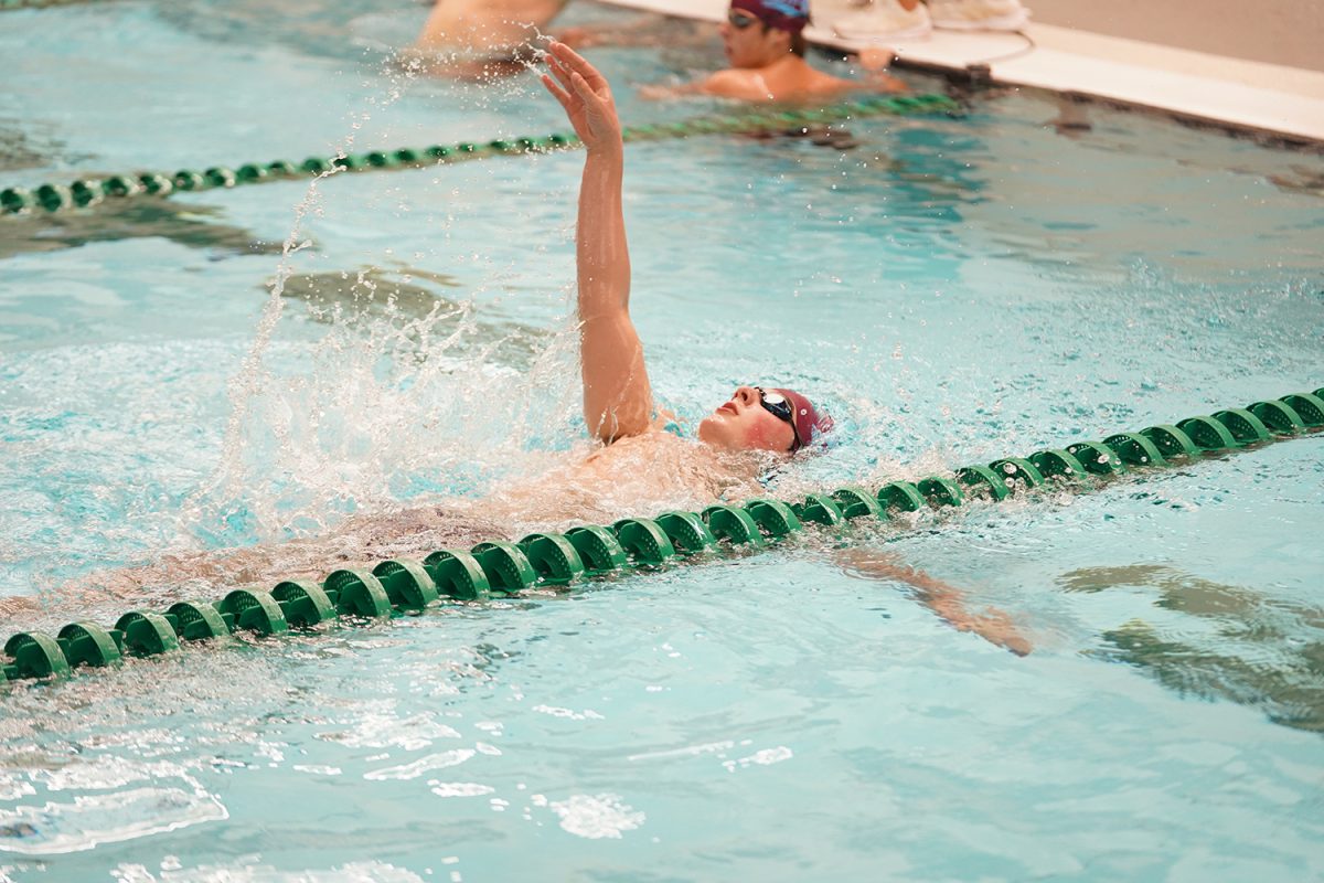 Jack Sherwood '28 swims backstroke on September 18th, 2024 vs MICDS. 