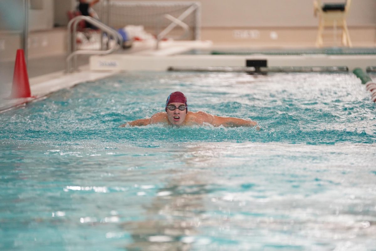 Jacob Baldes '25 swims butterfly on September 18th, 2024 vs MICDS. 