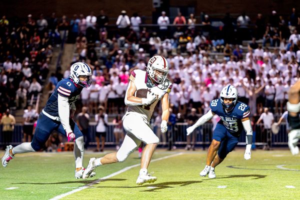 Tight end, Liam Russo '25 runs through SLUH defenders for a touchdown on September 13th 2024 at SLUH.