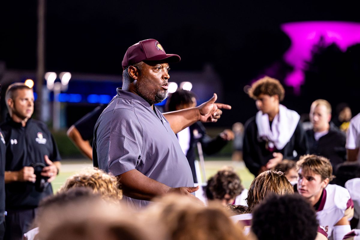 Head Coach, John Merrit, congratulates his team after big win vs SLUH on September 13th 2024 at SLUH.