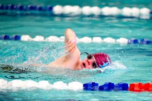 '27 Peter Marvin competes in the 50 yard freestyle at Ladue meet