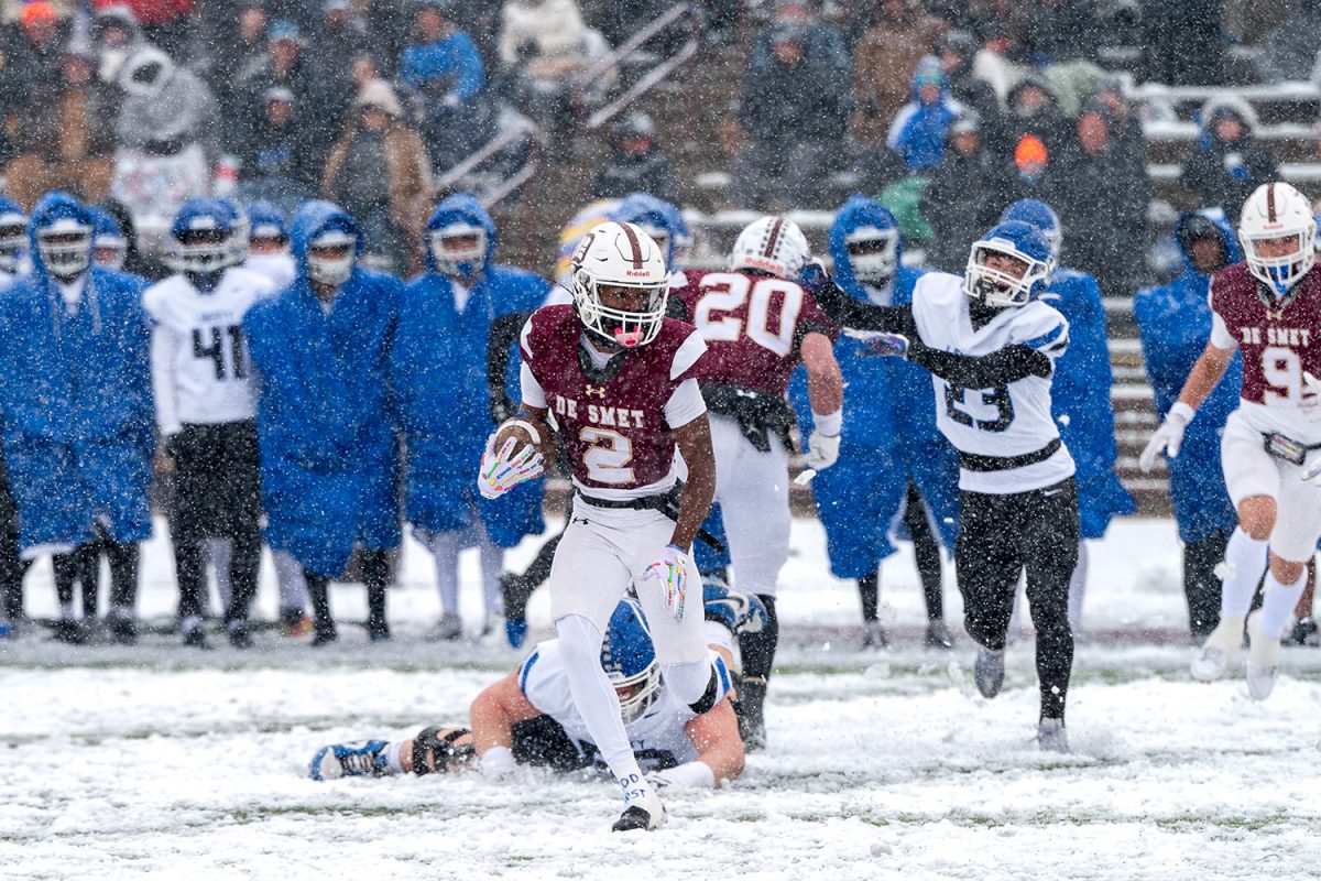 Josiah Houston '25 runs with the ball on Saturday November 30, 2024 vs Liberty Kansas City.