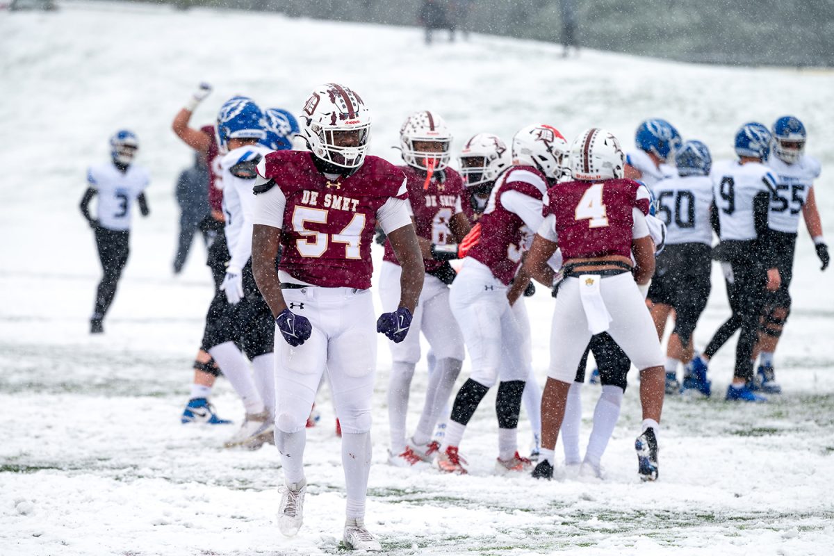 Quincy Byas '25 fires up after the win against Liberty Kansas City 35-15 on Saturday November 30, 2024.