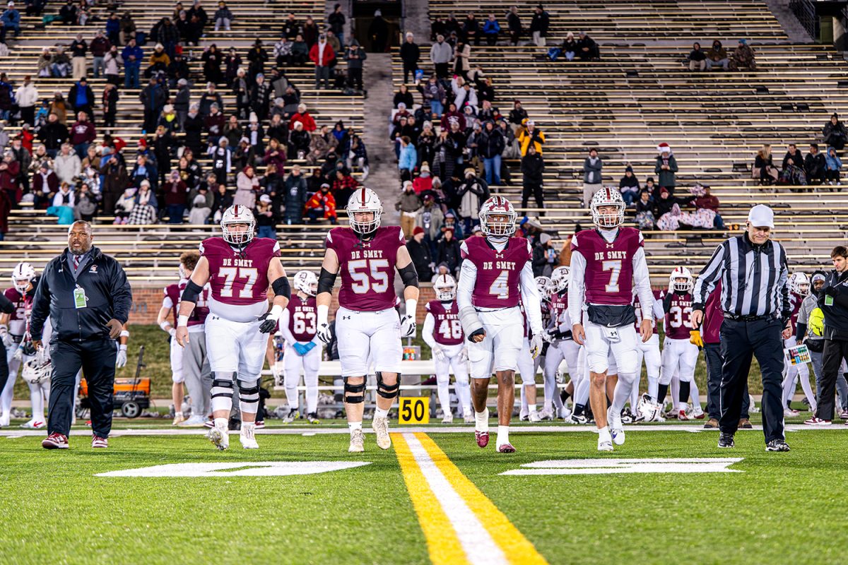 The De Smet captains walk onto the field before their game vs Nixa on Friday December 6, 2024 at Mizzou. 