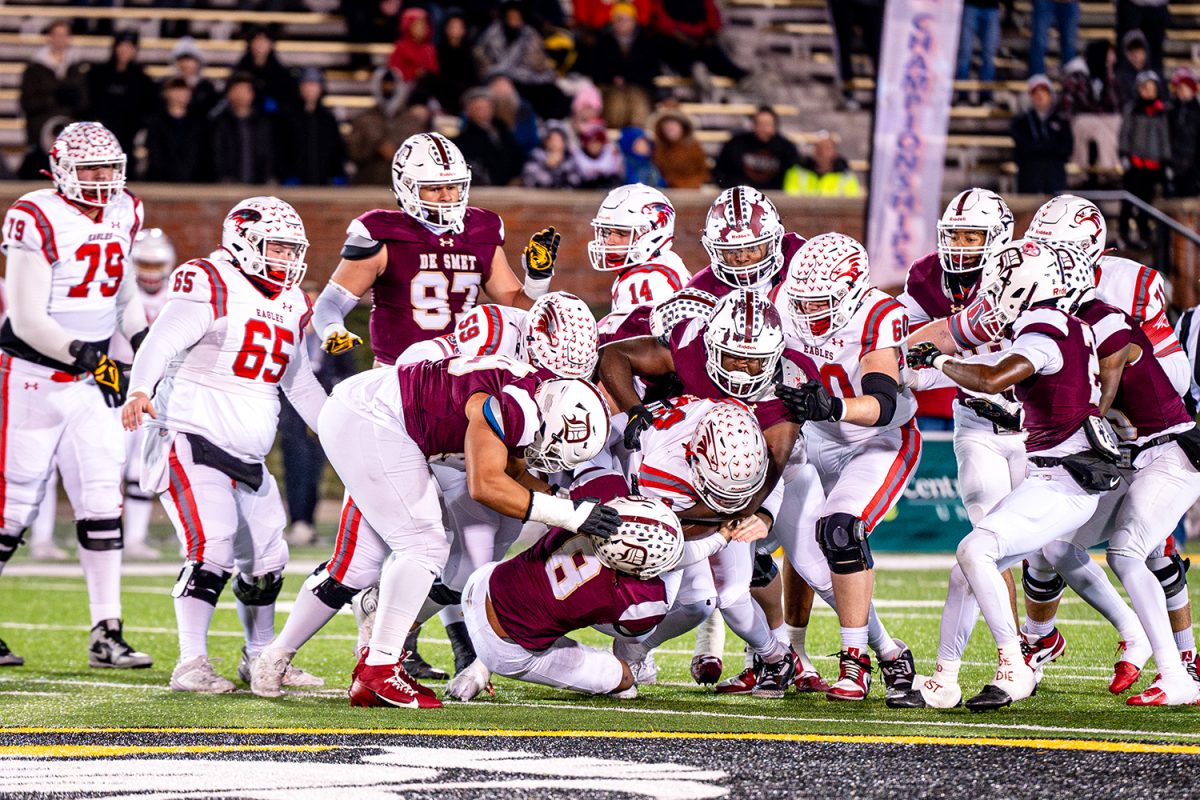 Defense tackles Nixa players during the state championship game in the class 6 state championship on Friday December 6, 2024 at Mizzou.