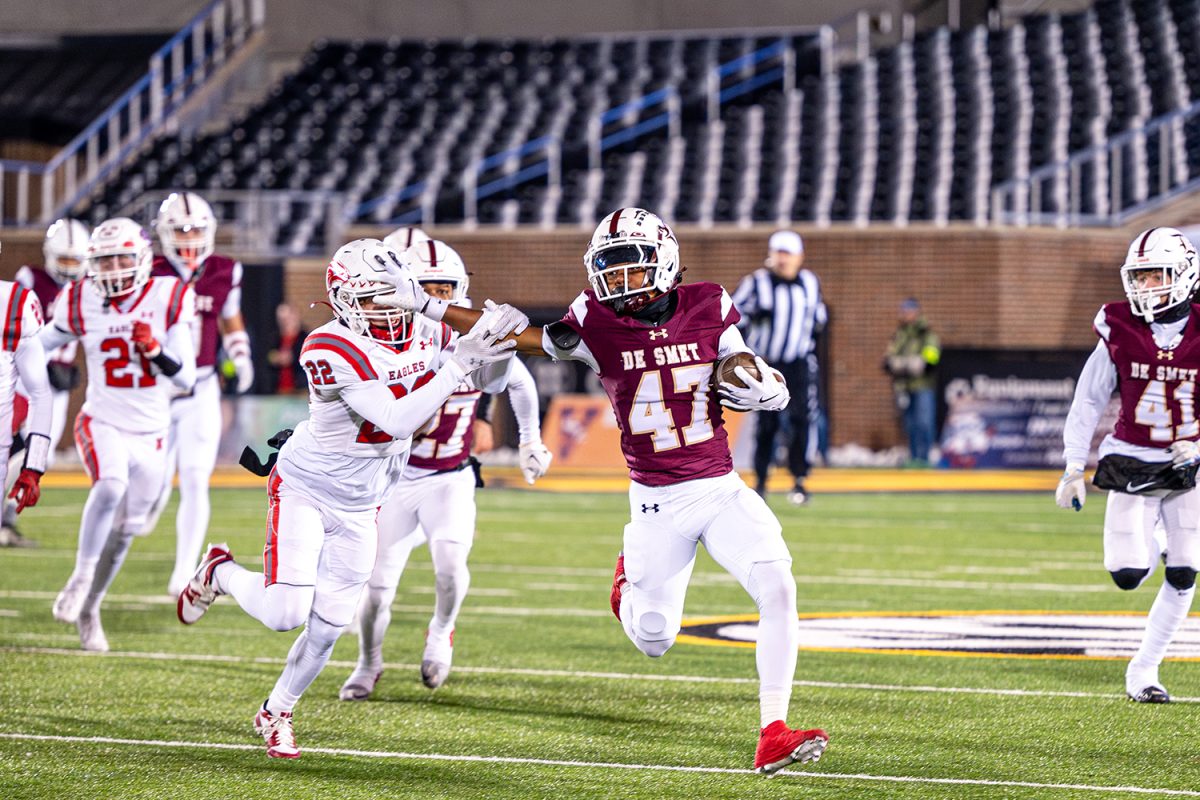 Cam Sharp '28 Stiff Arms Nixa Defender on a punt return  in the class 6 state championship on Friday December 6, 2024 at Mizzou.