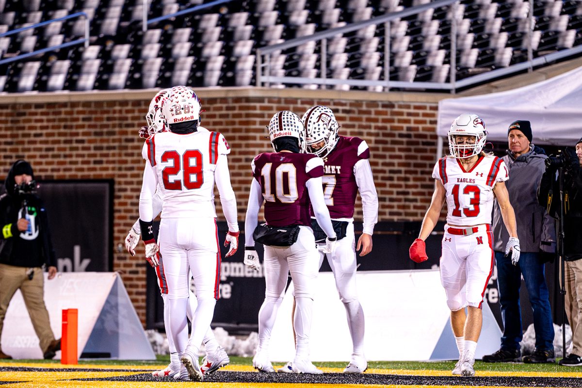 Quarterback Dillon Duff '25 celebrates after his rushing touchdown in the class 6 state championship on Friday December 6, 2024 at Mizzou.