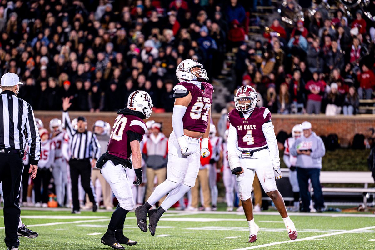 Defender Titan Davis '26 jumps in excitement after tackle for loss in the class 6 state championship on Friday December 6, 2024 at Mizzou. 