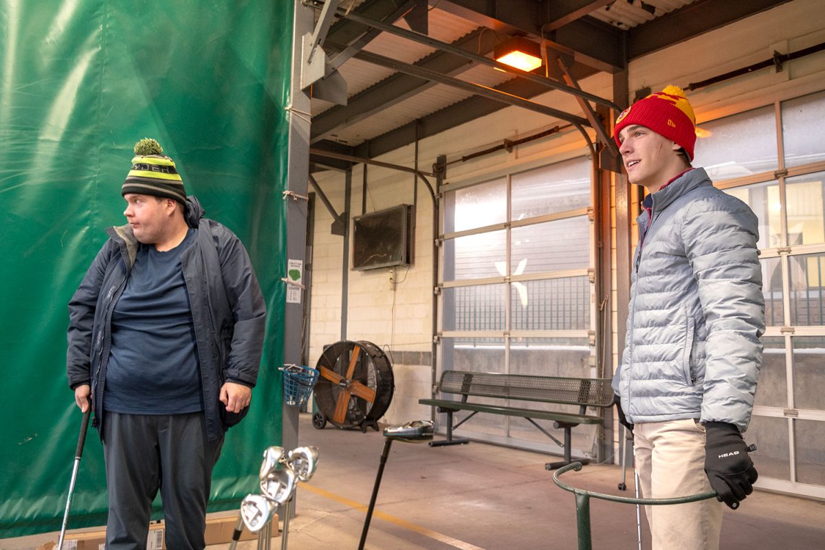 Alex Renschen '25 goes to a driving range and eyes it out with 24 year old with autism, John McNulty. 