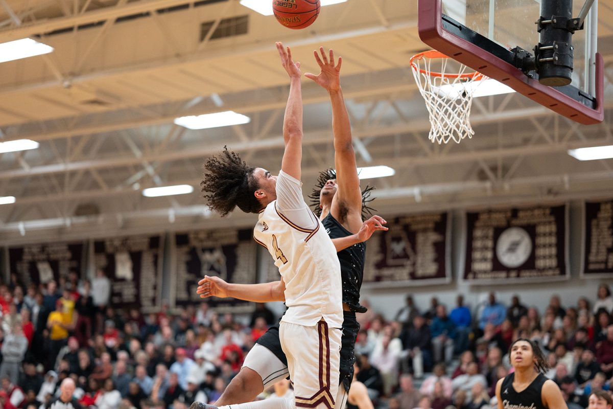 Jordan Boyd '26 goes up for a layup against Chaminade. Playing a sport for the school should result in a PE credit, and here's why. 