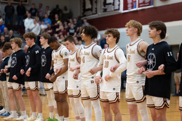 Spartan Basketball lines up before their district game against Chaminade on Monday March 10th.