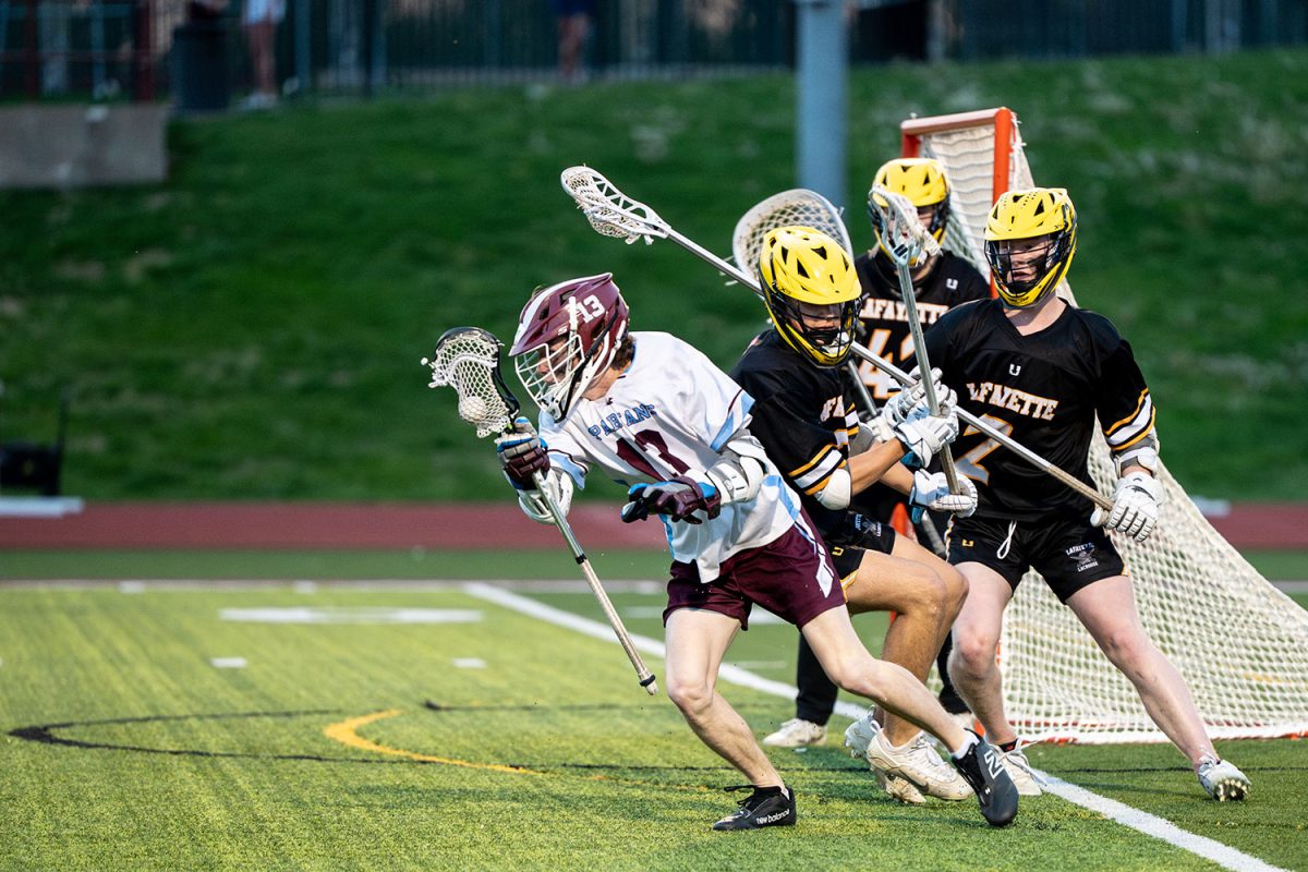 William Puckett '25 out maneuvers Lafayette defense on April 23rd, 2025.