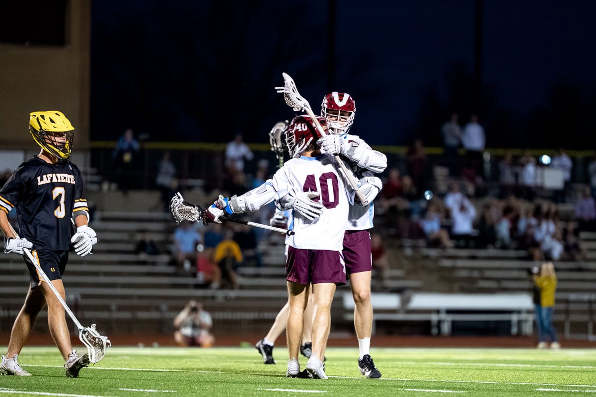 De Smet attackers celebrate scoring goal against Lafayette on April 23rd, 2025.