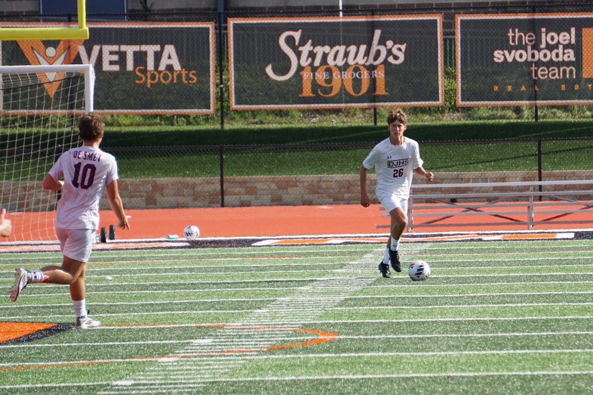 Caden Fleming dribbles down the field during the Soccer Jamboree on Friday, August 22.