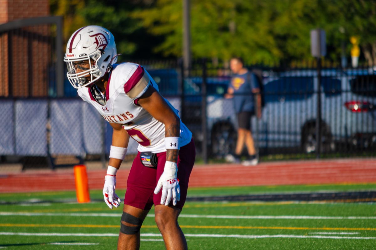 Defensive back Amari Williams ’26 sets up for the next play against Vianney.