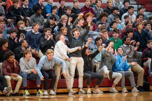 Students holler, "stuff the bus!" during the Great Ignatian Challenge kickoff assembly Oct. 22. The goal of the challenge is to collect 30,000 pounds of non-perishable items for St. Patrick's Center.