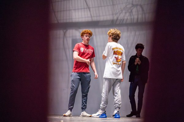 Ben Duffy ’26 and William Lambert ’29 discuss cues in the fight scene at rehearsal for the fall play, The Outsiders