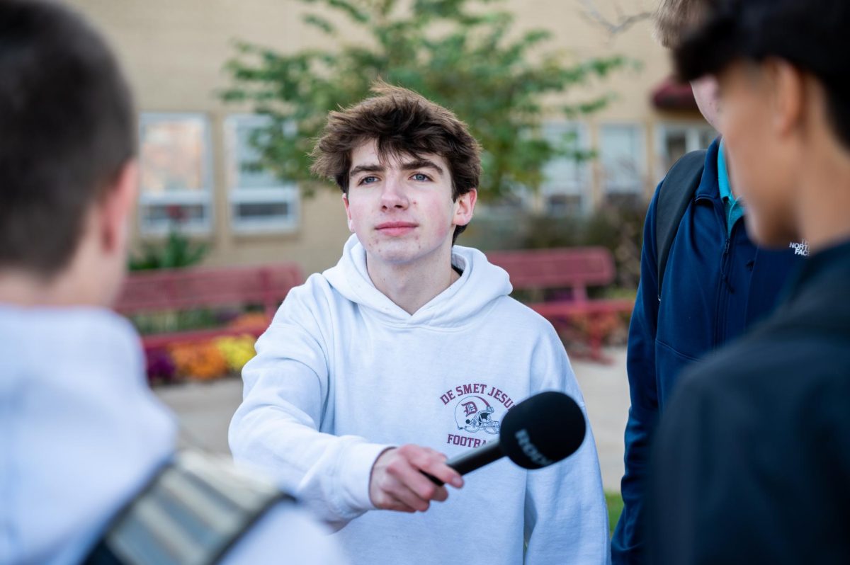 Dan O'Reilly '27 reporting at the Great Ignatian Challenge can collection.