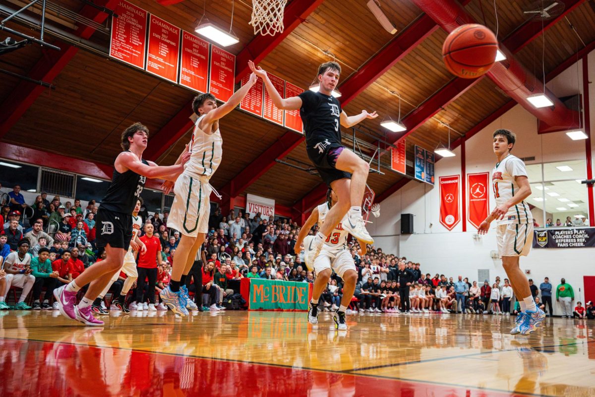 Will Foulk '27 deflects a shot mid-air against Chaminade on Jan. 9, 2026.