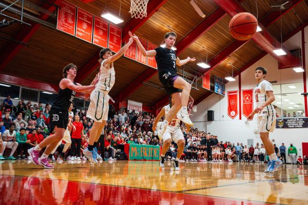 Will Foulk '27 deflects a shot mid-air against Chaminade on Jan. 9, 2026.