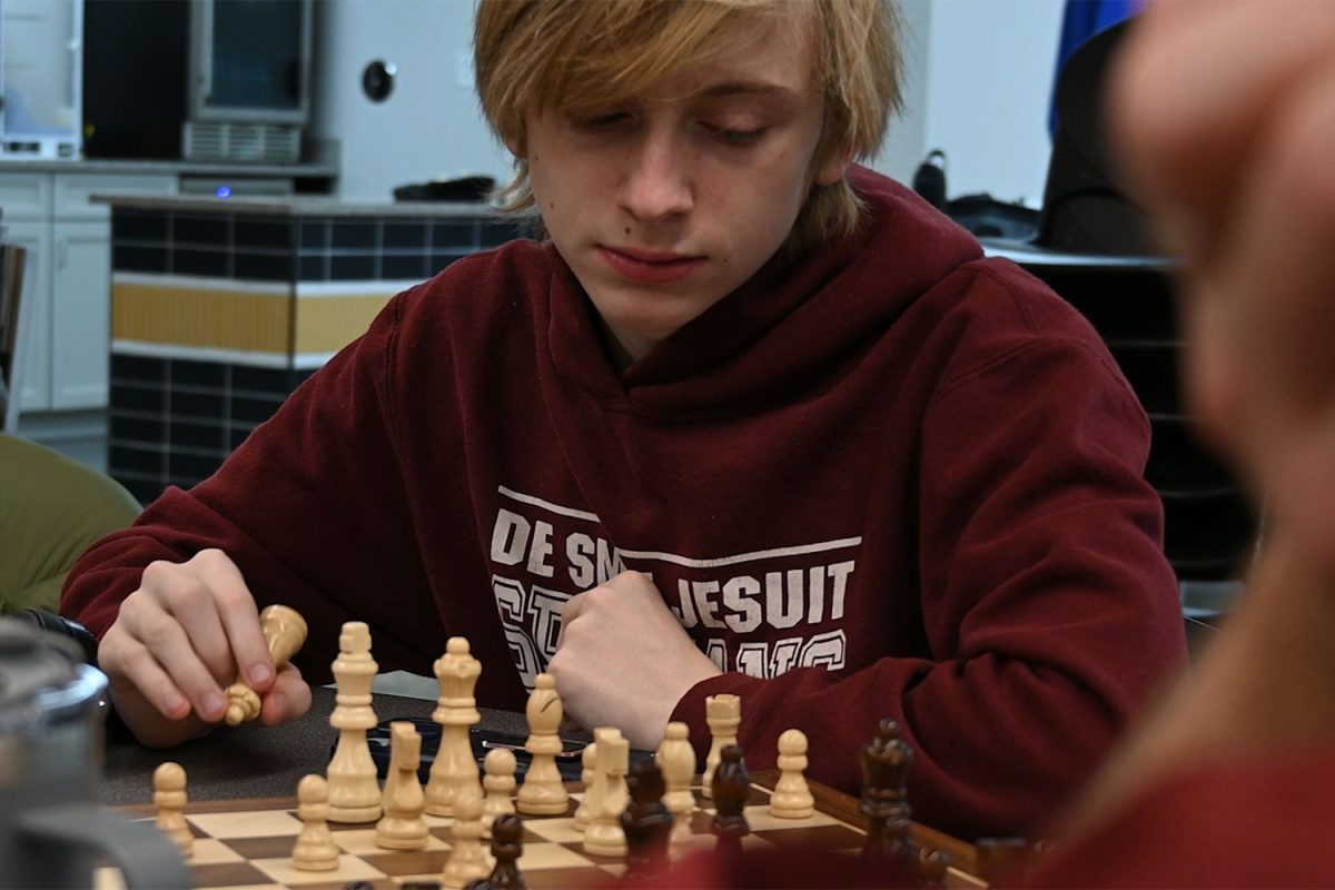 Trent Givens '28 is using competition within his own team to improve as a competitive chess player.